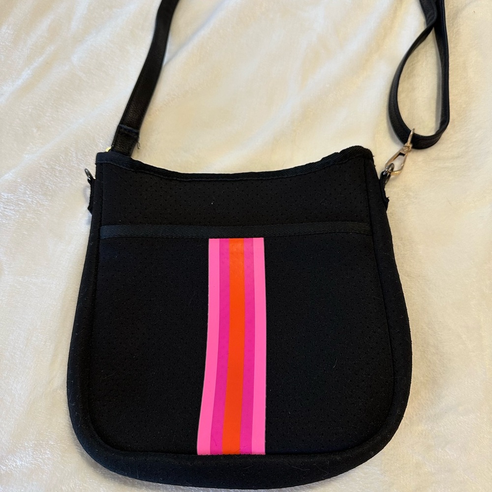 Haute Shore Jeri Black Crossbody Bag. Pink/Orange stripe 2 straps 8.5x2x9.5